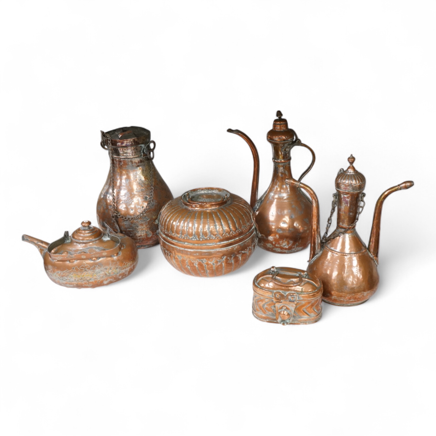 A collection of six various Arab copper vessels to include coffee pots, tallest 37cm